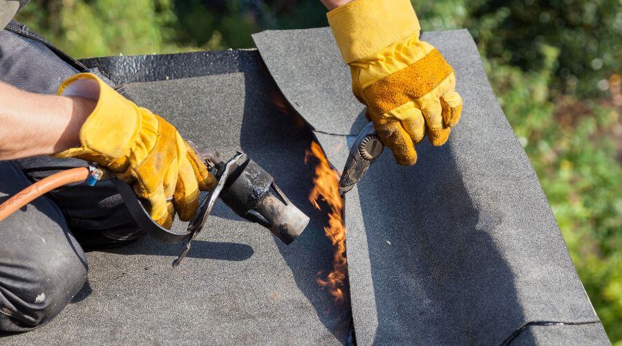 Professional gutter cleaning in Luana, IA